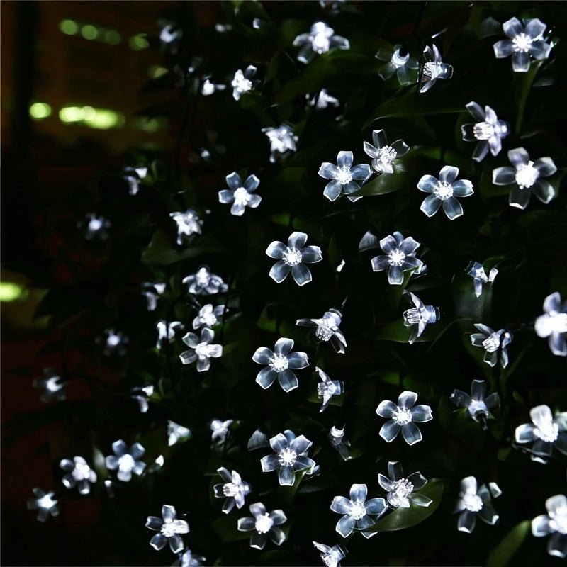 Guirlande solaire fleur de cerisier façade